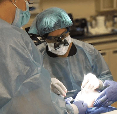 Dr Prasad performing Surgery