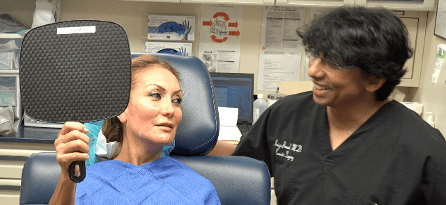 Dr Amiya Prasad with female patient