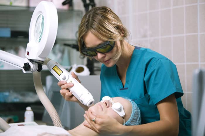 woman receiving laser resurfacing