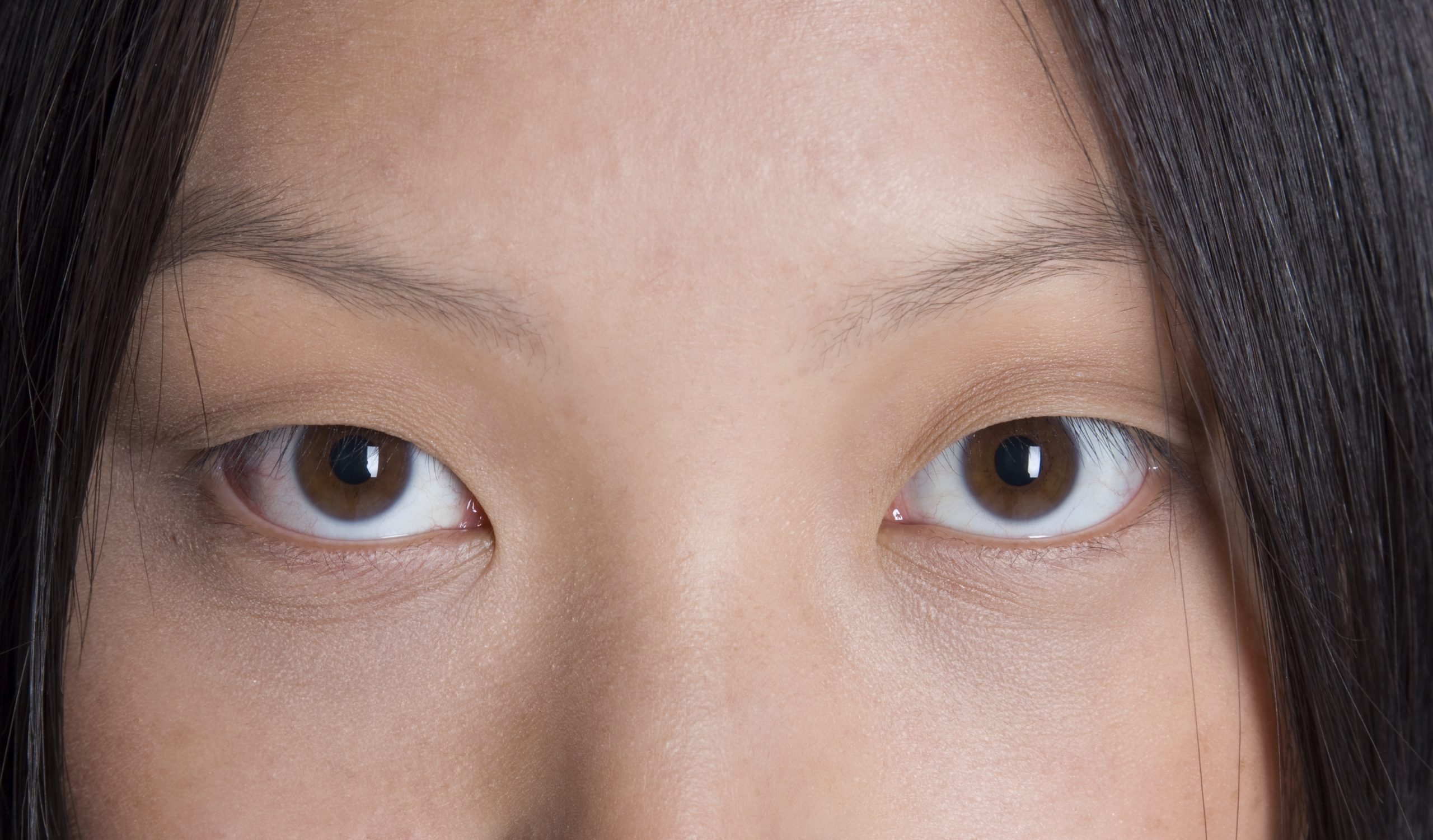 Young Asian woman with monolid eyes
