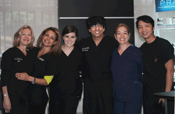 Pre med student Alyssa with Dr Amiya Prasad and medical staff